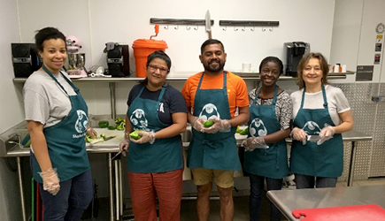 Helping to prepare food for Shepherd’s Table, a resource center for people experiencing homelessness